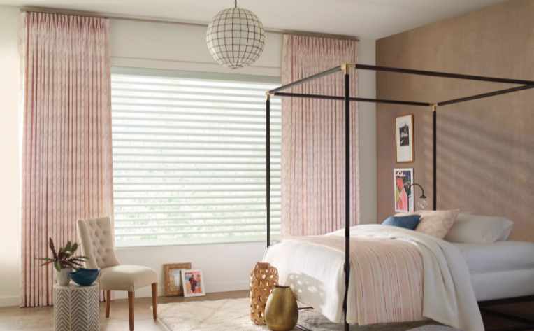 light filtering panels and drapery in pink accented bedroom